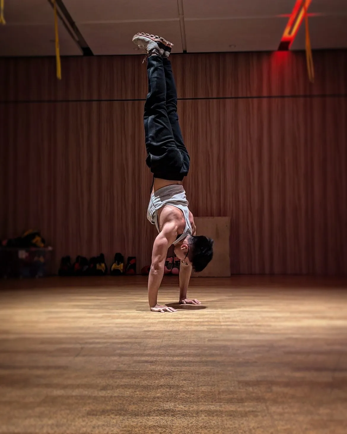 Jeremiah Lung holding a freestanding handstand